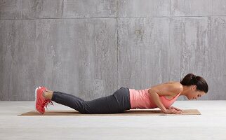 Push-Ups (HIIT), step 1: lay face down, bend arms