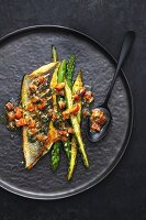 Bass with tomato & herb sauce and green asparagus
