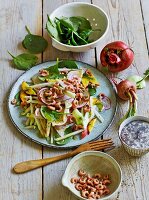 A summery kohlrabi salad with shrimps, nectarines and lettuce