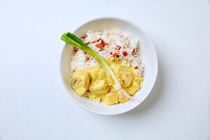 Fish curry with goji berry rice and spring onions