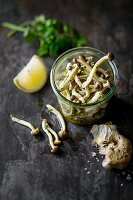 Pickled enoki mushrooms with garlic, lemon juice and parsley