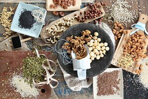 An arrangement of different nuts, seeds and kernels for a vegan diet