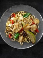 Yellow Oyster mushroom stir fry with noodles, mange tout, red pepper, spring onions and start anise