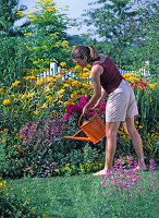 Spice up a yellow flower bed with colorful perennials