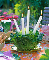 Savoy cabbage as a candle holder