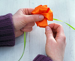 Ribbon rosette as napkin deco