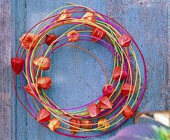 Lantern flowers on colorful rattan cane