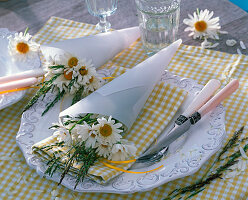 Daisies in transparent paper bag