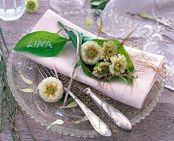 Small bouquet in hosta leaf