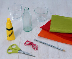 Bottles glued with felt flowers as small vases (1/5)