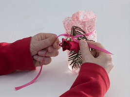 Lantern in pink fabric bags