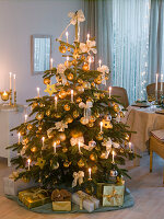 Christmas tree decorated white-gold