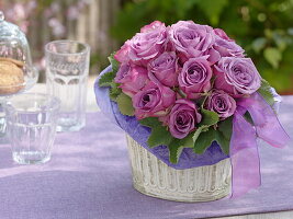Biedermeier bouquet of violet, fragrant roses
