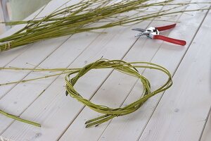 Yellow daffodil bouquet in dogwood branches wreath