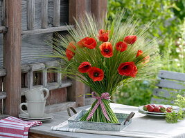 Bouquet of poppies and barley