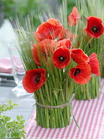 Barley sheathed glasses as vases