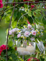 Preserving jar with herb wreaths hung as a lantern