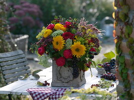 Bouquet of Helianthus (sunflowers), Rosa 'Red Leonardo da Vinci' (roses)