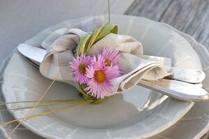 Autumn table decoration with asters and pears