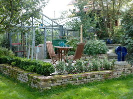 Art garden, terrace at the greenhouse