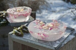 Homemade ice wind lights with rose petals