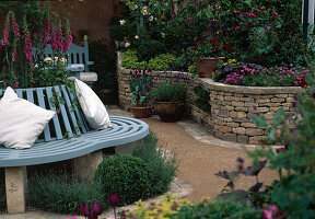 Round bench around tree, dry stone wall