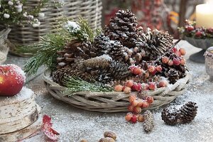 Late autumn table arrangement with the first snow