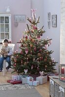 Christmas tree with hearts, cones and apples