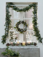 Christmas window decoration with view into the room