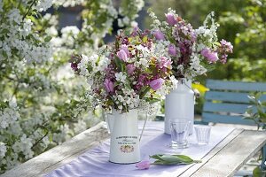 Bouquets of Malus (ornamental apple) and Spiraea (ornamental shrub) branches