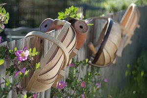 Chip baskets and clay pots at the farm garden fence