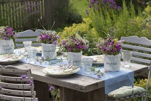 Summer table decoration with meadow flowers