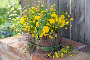 Bark glued on plastic box as a plant box