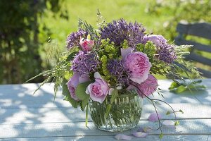 Small bouquet of Allium christophii (star-shaped leek), pink