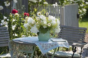 Small sitting area with peony bouquet