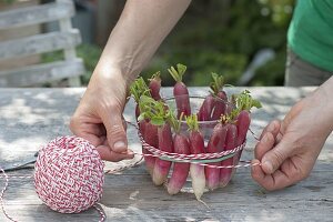 Glass bowl dressed as a vase with radishes