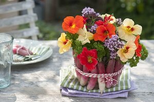 Glass bowl dressed as a vase with radishes