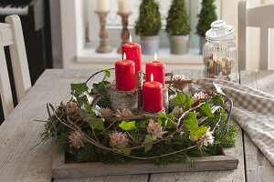 Rural Christmas wreath on wooden tray