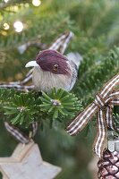 Christmas tree with birds and stars made of birch bark