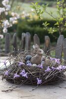 Wreath of Larix and Betula branches as easter nest