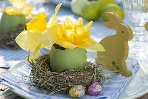 Covered Easter table with daffodils