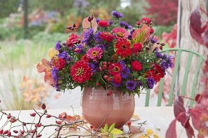 Autumn bouquet made of Zinnia, Aster, Rosa