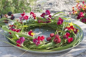 Grass wreath of Miscanthus decorated with Antirrhinum