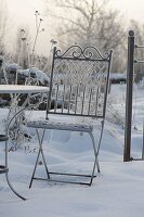 Hoarfrost crystals on nostalgic metal chair