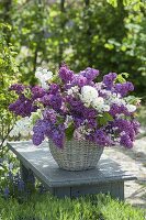 Lush Syringa and Malus branches bouquet