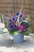 Bouquet made of perennial flowers and grasses, Echinops (Globular thistle)