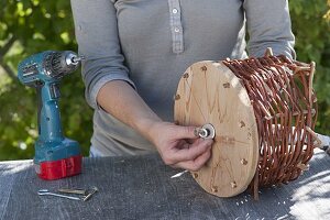 Build hanging basket out of wicker and floor wood