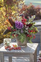 Colorful autumn bouquet with vegetables, fruits and herbs