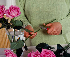 Tying a bouquet of roses