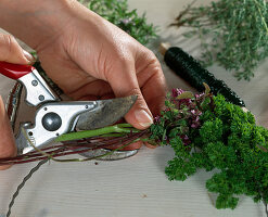 Tying a herb wreath